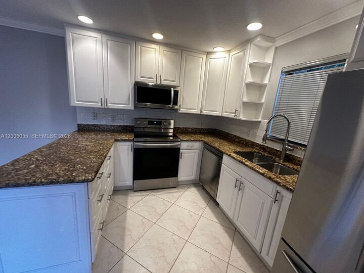 Property Photo:  7671 W Courtyard Run W  FL 33433 