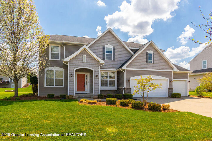 Property Photo:  2611 Lupine Drive  MI 48864 