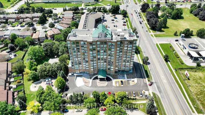 Property Photo: 711 Rossland Road E 505 ON L1N 8Z1
