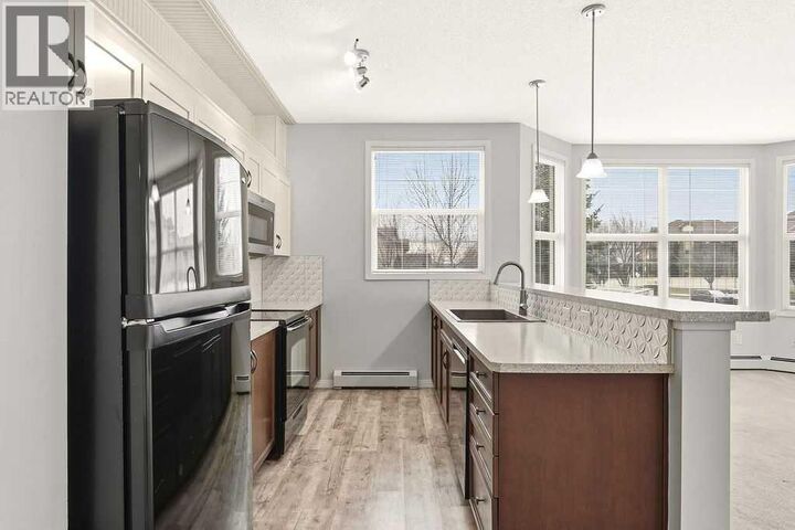 Property Photo:  1 Crystal Green Lane  AB T1S 0C5 