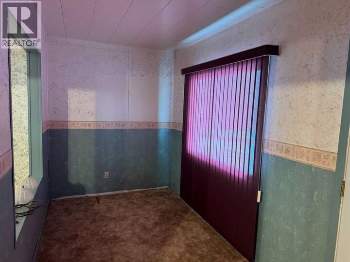 Property Photo: 61 Mackenzie Avenue AB T0B 2E0