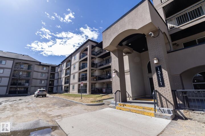 Property Photo: 13111 140 Avenue NW 209 AB T6V 0B1