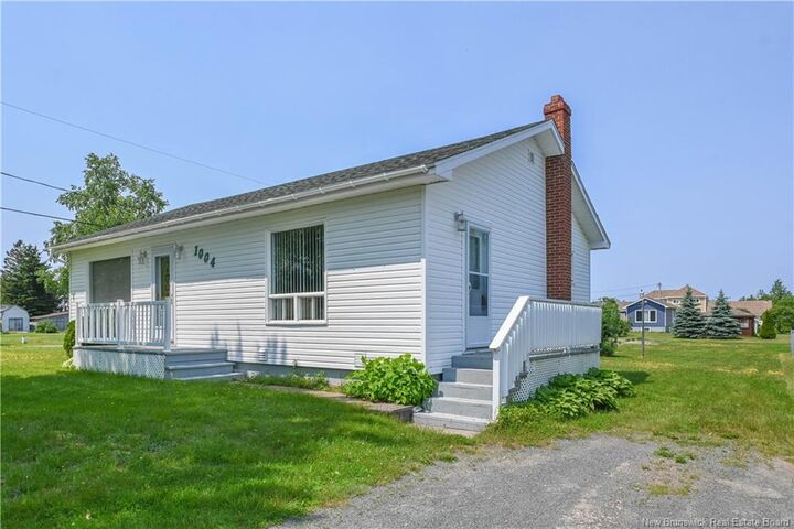 Property Photo: 1004 Saint-Joseph Boulevard NB E8N 2S3