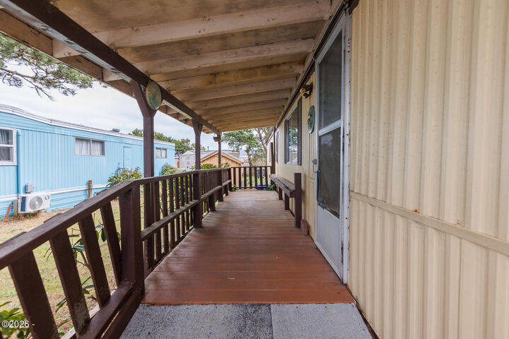 Property Photo:  955 NE Mill Street C8  OR 97394 