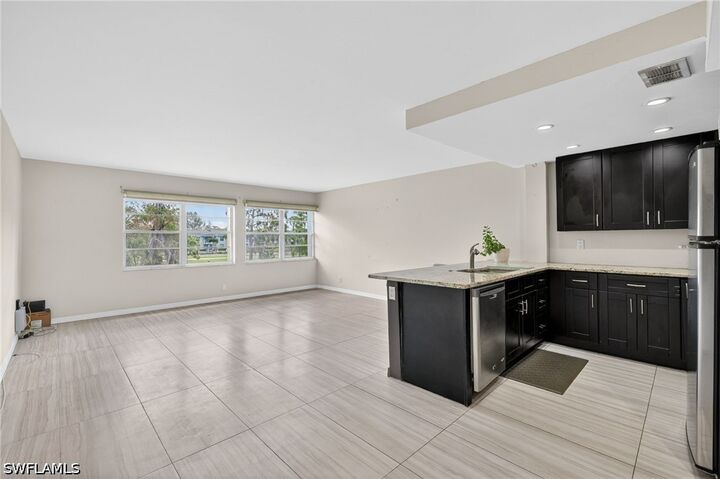 Property Photo:  1084 Forest Lakes Drive 7205  FL 34105 