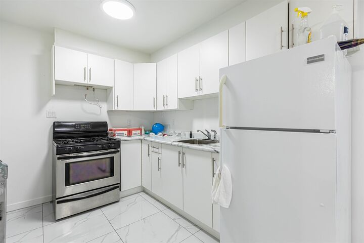 Property Photo:  14312 69A Avenue  BC V3W 0E2 