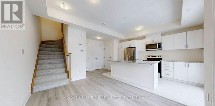 Property Photo: 165 Tapscott Road 32 ON M1B 0E8
