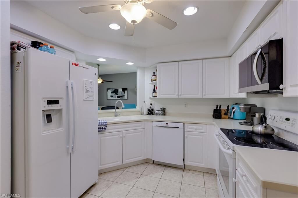 Property Photo: 25080 Peacock Ln 102 FL 34114