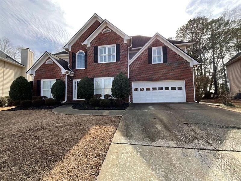 Property Photo:  1568 Ridge Point Drive NW  GA 30043 