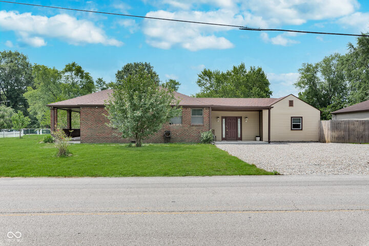 Property Photo:  1402 S Hawthorne Lane  IN 46203 