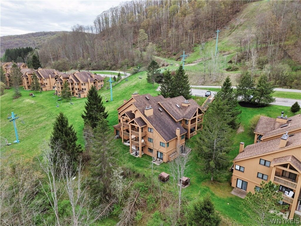 Property Photo:  E104 Snowpine Village  NY 14741 
