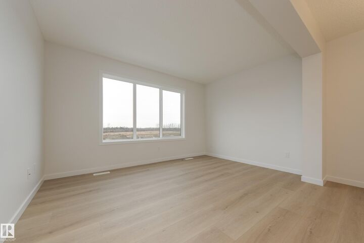 Property Photo: 17226 4 Street NW AB T5Y 4K8