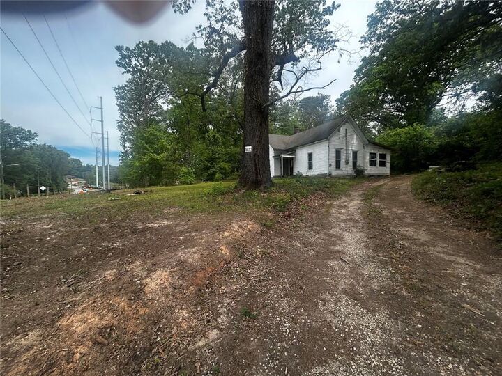 Property Photo:  4854 Stonewall Tell Road SW  GA 30349 