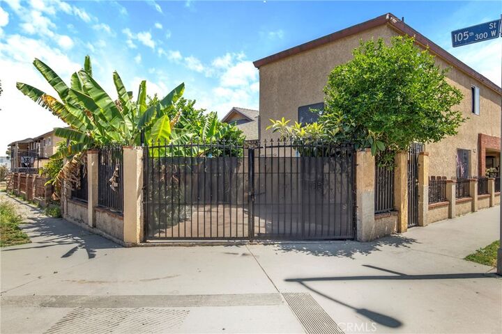 Property Photo:  322 W 105th  CA 90003 