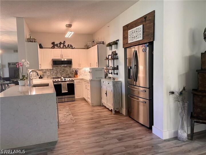 Property Photo:  56 Silver Oaks Circle 102  FL 34119 