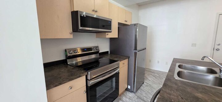Photo de la propriété: 73 Erin Woods Court SE 1206 AB T2B 3V2