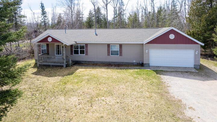 Property Photo:  22098 US-23 N Highway  MI 49759 