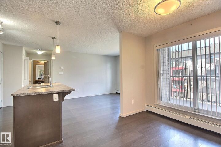 Property Photo: 344 Windermere Road NW 324 AB T6T 0P3