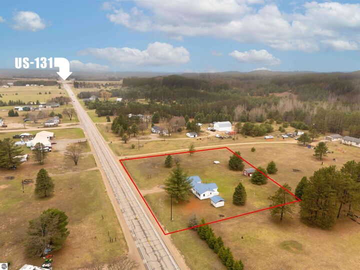 Property Photo:  10595 E M-42  MI 49663 