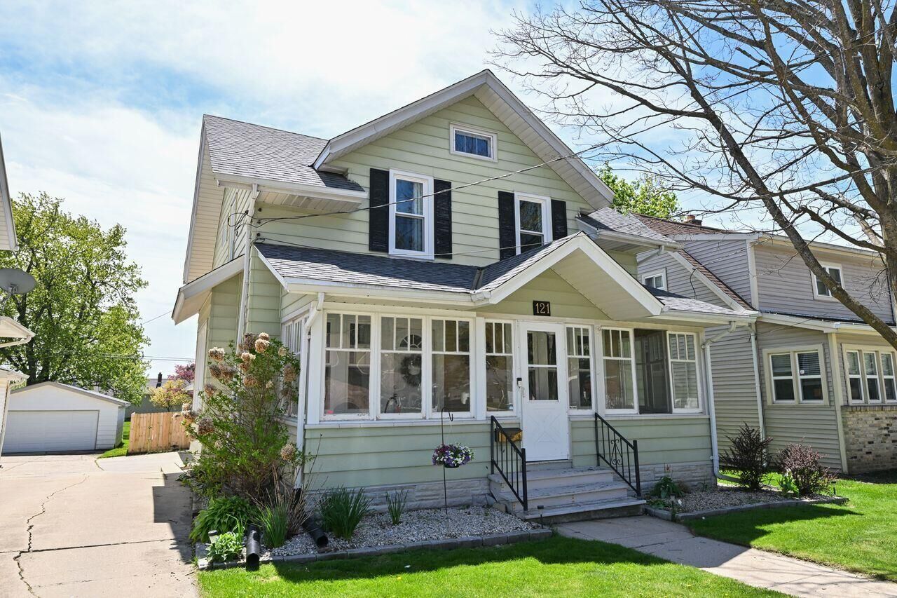 Property Photo:  121 W Washington Ave  WI 53027 