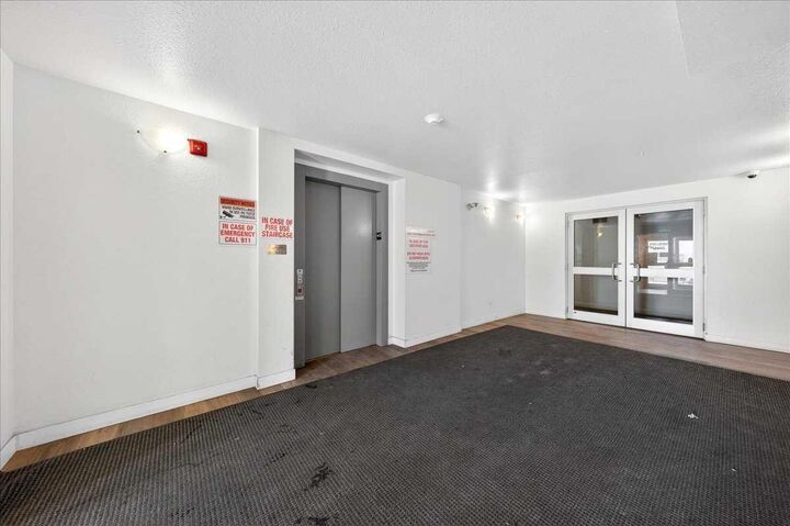 Property Photo:  6118 80 Avenue NE 2208  AB T3J 0S6 