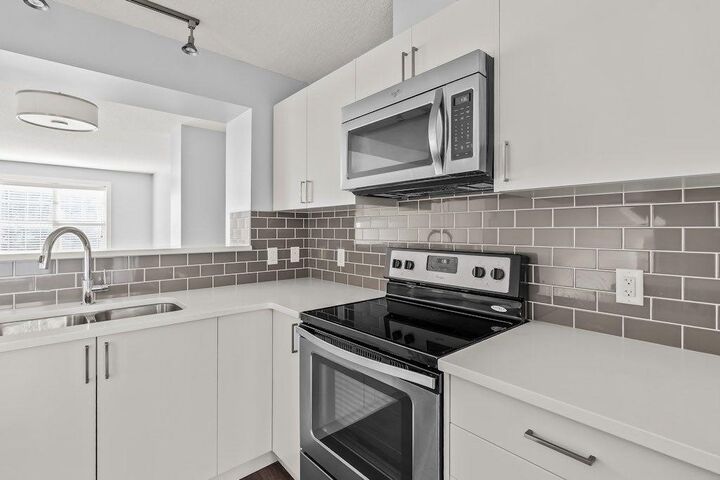 Property Photo:  4 Evanscrest Gardens NW  AB T3P 0S1 