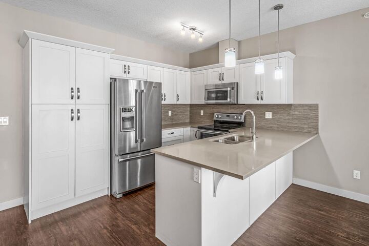 Property Photo:  522 Cranford Drive SE 5410  AB T3M 2L7 
