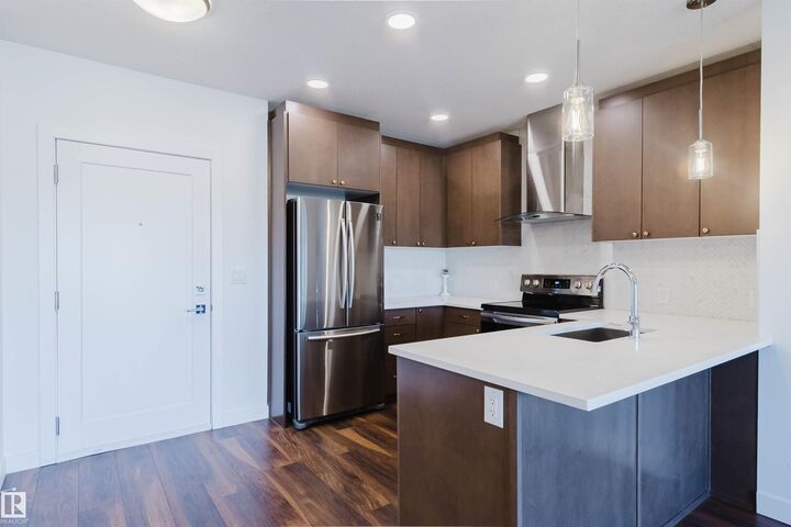 Property Photo:  1316 Windermere Way SW 205  AB T6W 2J3 