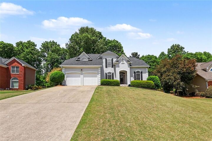 Property Photo:  5640 The 12 Fairway  GA 30024 