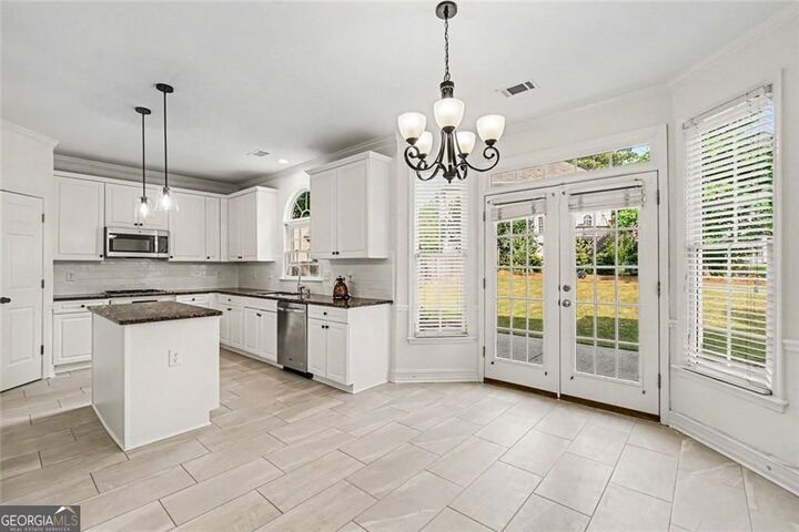 Property Photo:  710 Wilde Rose Court  GA 30075 
