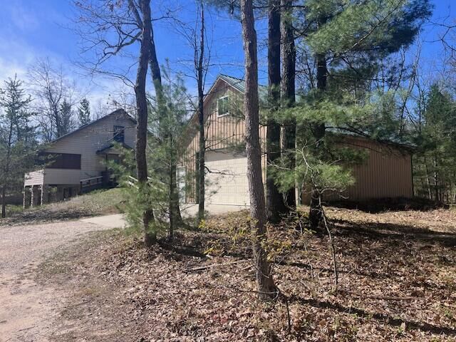 Property Photo:  1990 Skocelas Road S  MI 49660 