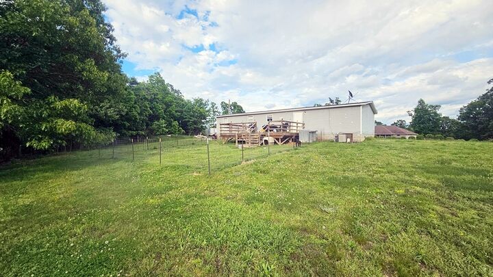 Property Photo:  442 Madison 8359  AR 72740 