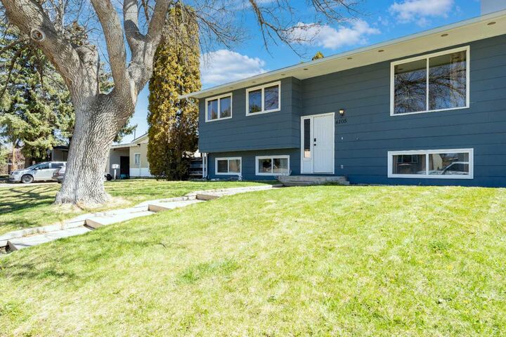 Property Photo:  6105 50 Street  AB T1G 1J7 