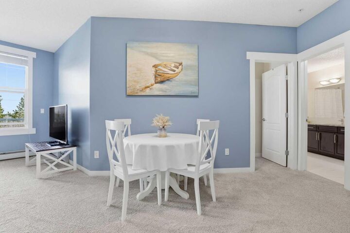 Property Photo:  1 Crystal Green Lane 228  AB T1S 0C5 
