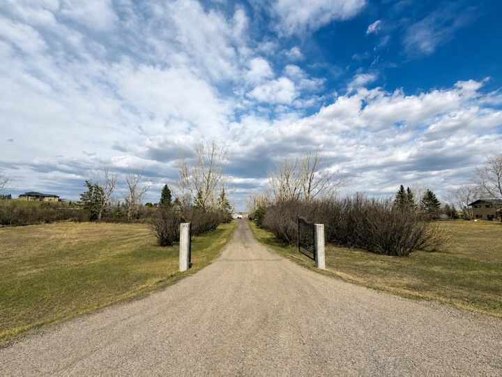 Property Photo: 292234 Township Road 264 AB T4A 0N3