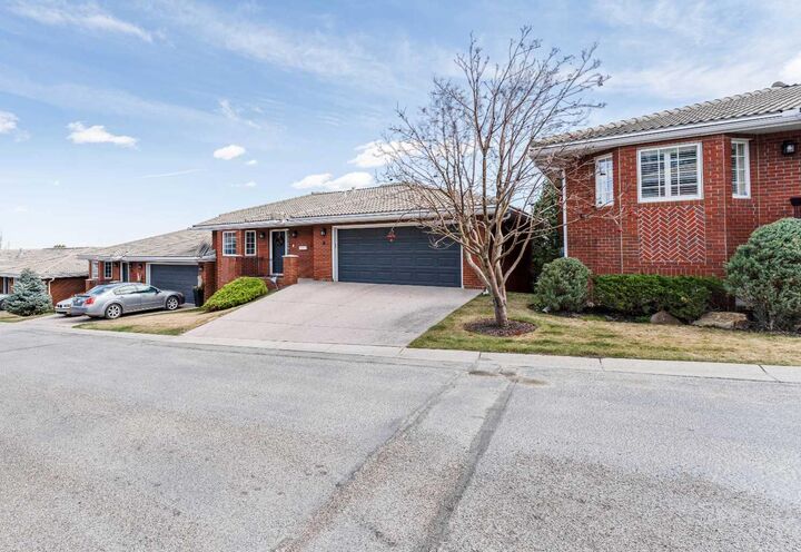 Property Photo:  8 Prominence Path SW  AB T3H 2W7 