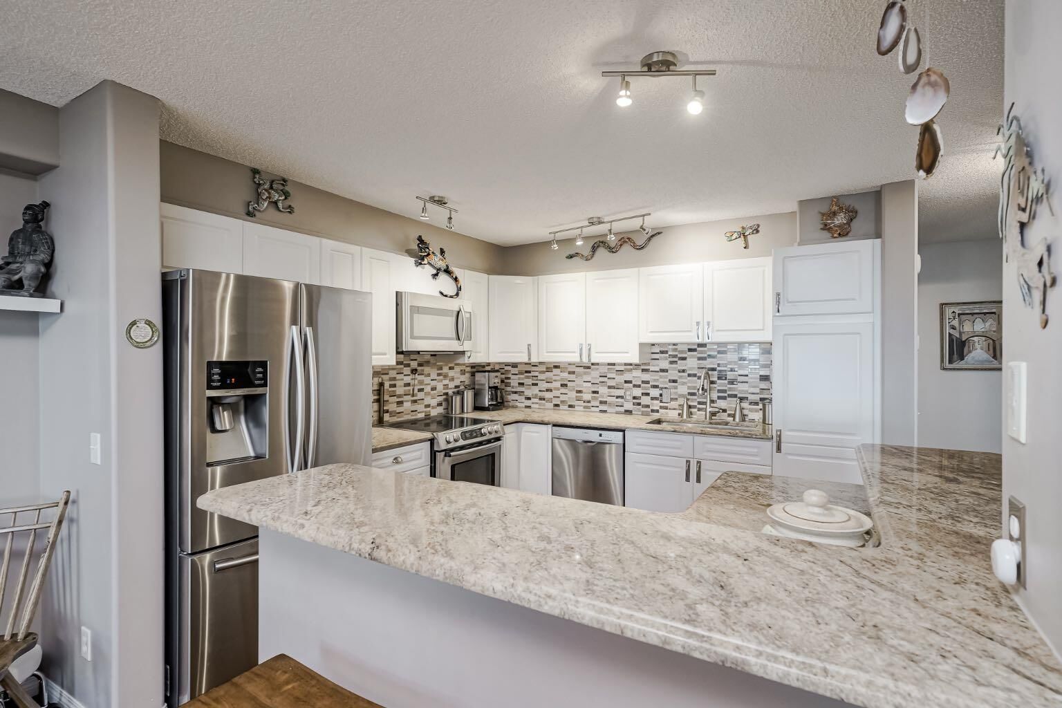 Property Photo:  200 Sandstone Drive NW 25  AB T3K 4N7 