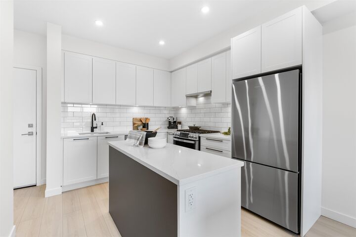 Property Photo:  32174 George Ferguson Way 405  BC V2T 0L3 