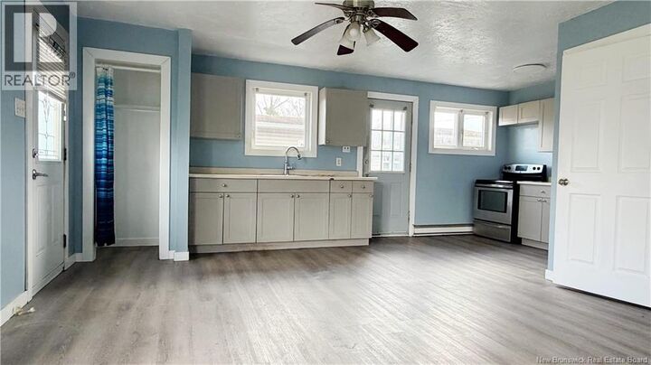 Property Photo:  118 Cedar Street  NB E1C 7L4 