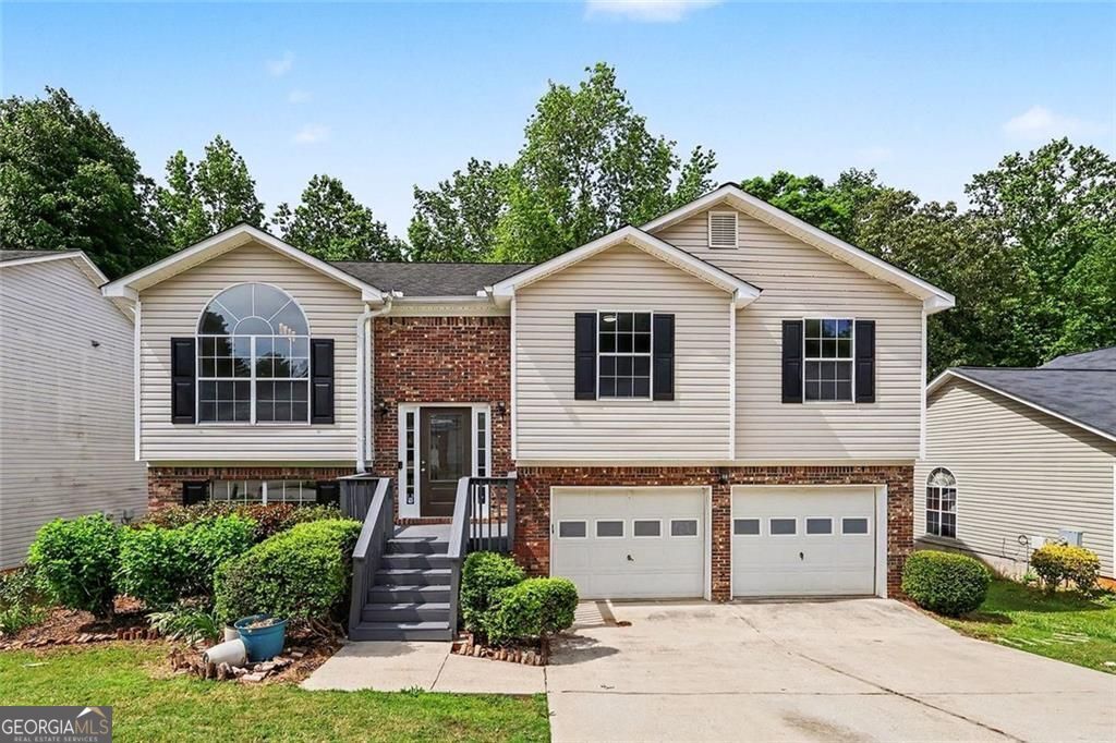 Property Photo:  5687 Wellborn Oaks Court  GA 30058 