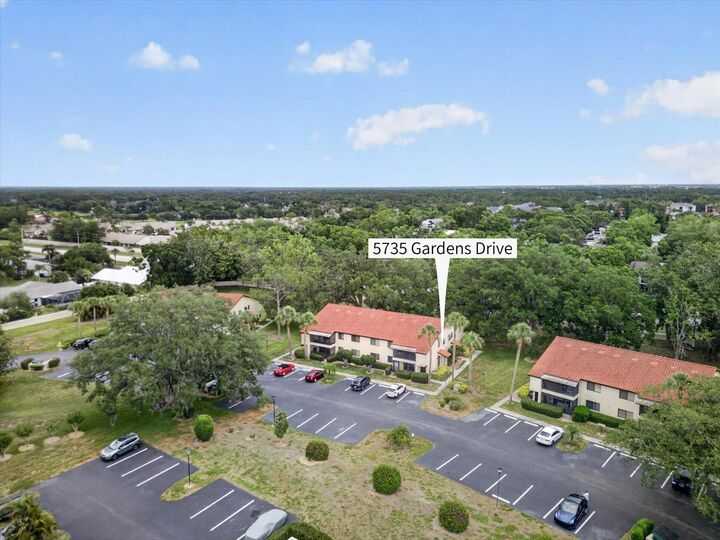 Property Photo:  5735 Gardens Drive 5735  FL 34243 