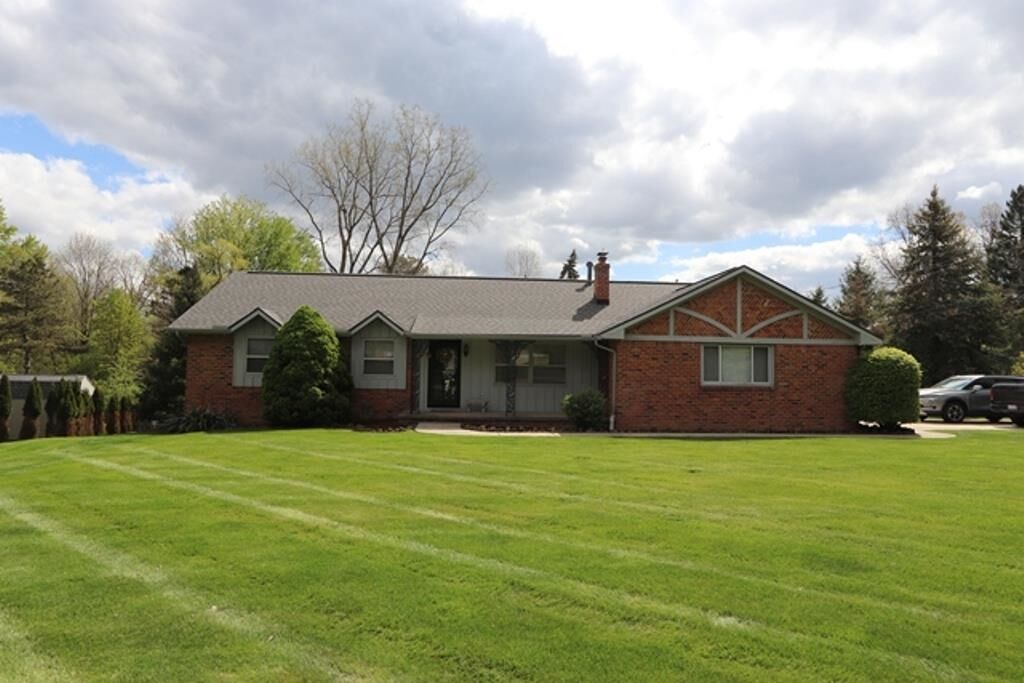 Property Photo:  8389 Manchester Drive  MI 48439 
