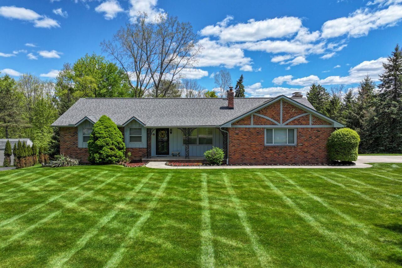 Property Photo:  8389 Manchester Drive  MI 48439 