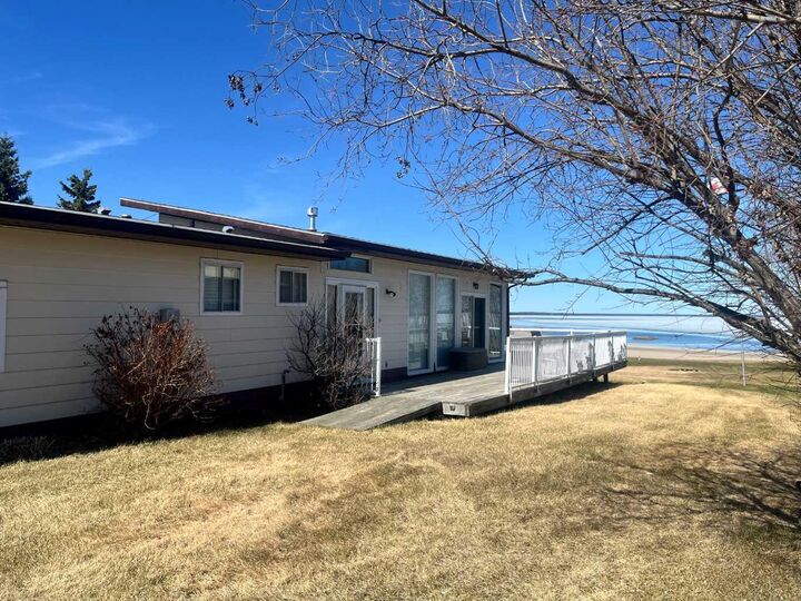 Property Photo:  303 Cumming Drive  SK S0M 1J0 