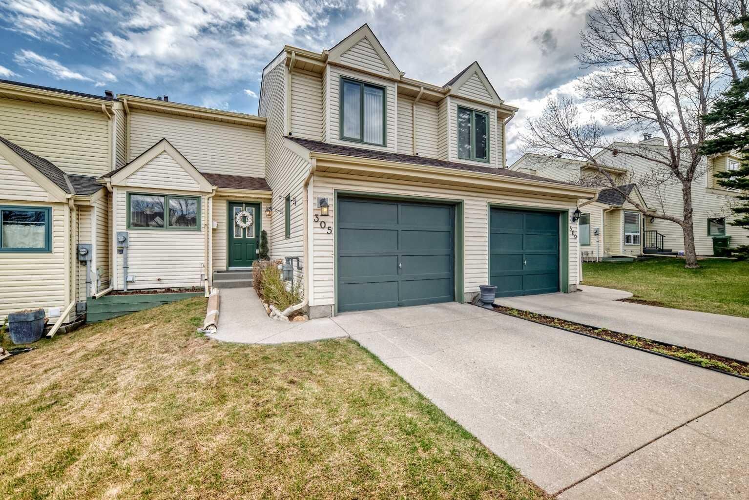Property Photo:  305 Sandringham Road NW  AB T3K 3Z1 