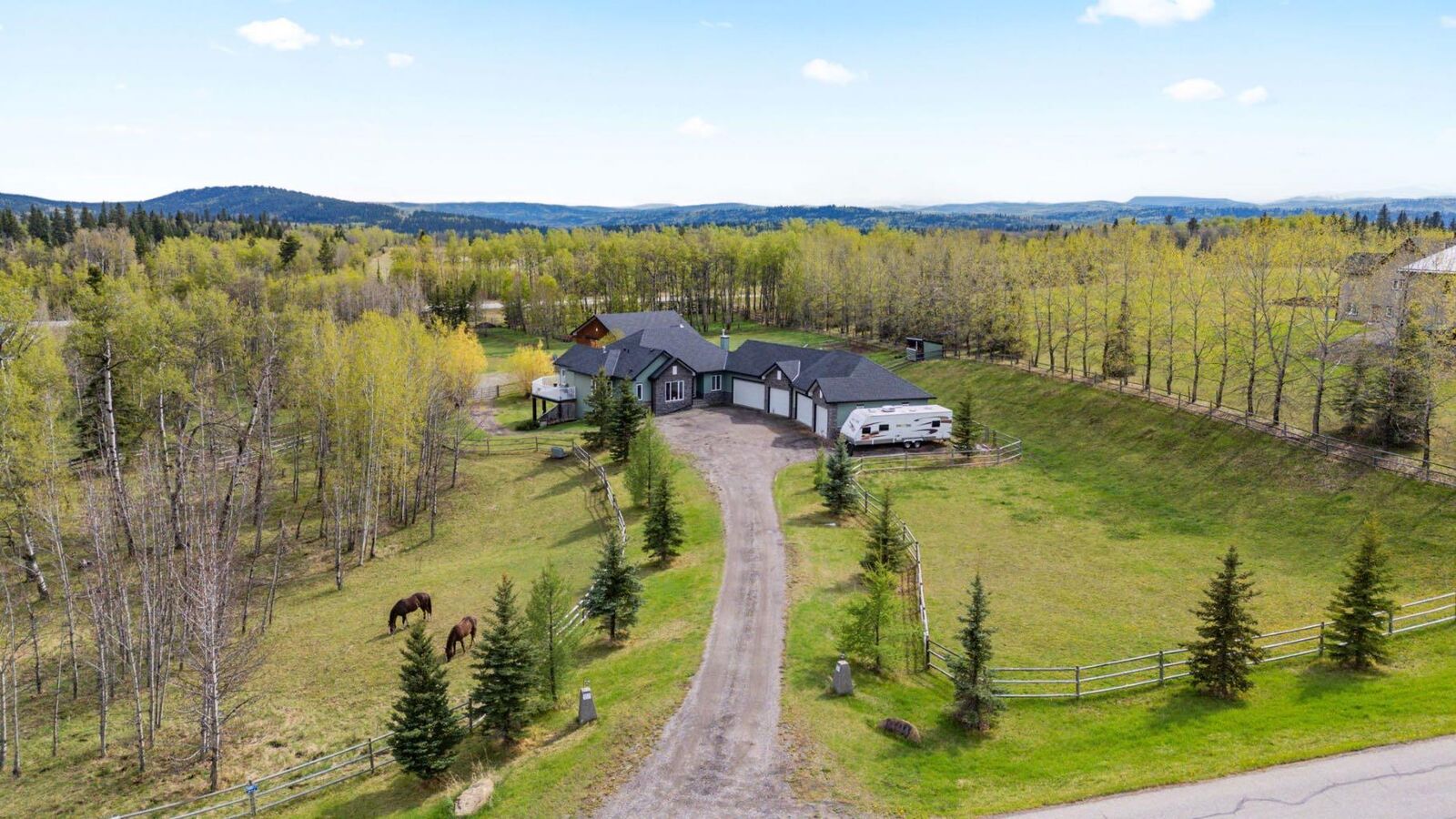 Property Photo:  288017 160 Avenue W  AB T0L 1W2 