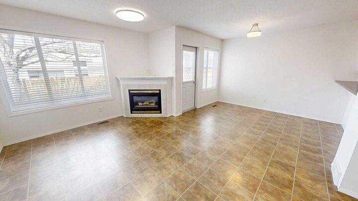 Property Photo:  545 Highlands Boulevard W 3  AB T1J 4V2 