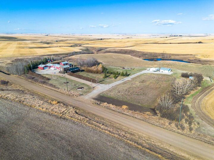Property Photo:  313029 Rge Rd 233  AB T0M 2A0 