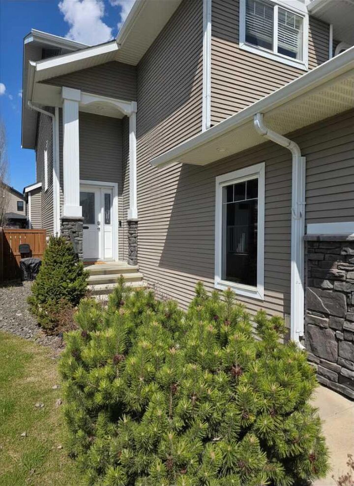 Property Photo:  210 Viscount Drive  AB T4R 0M7 