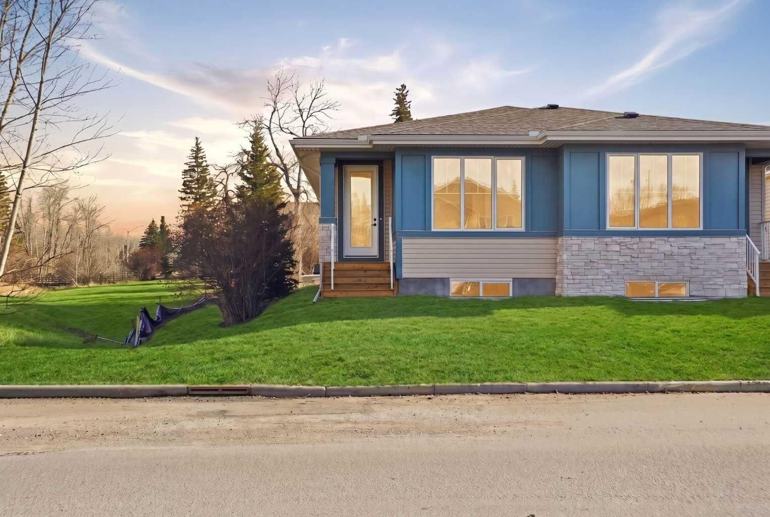 Property Photo:  123 5 Avenue SE  AB T1V 1G2 